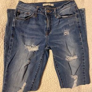 Distressed Buckle Skinny Jeans